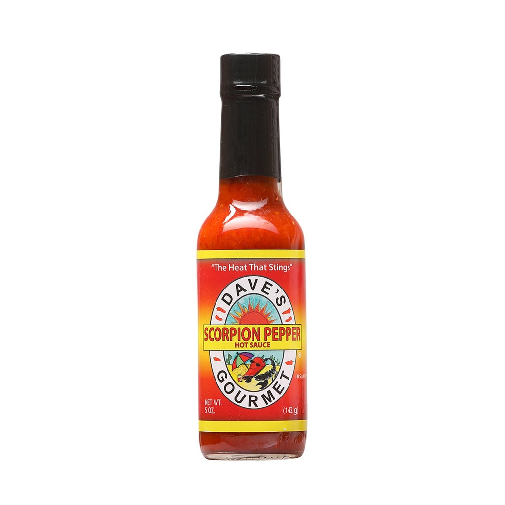 A 5-ounce bottle of Daveās Gourmet Scorpion Pepper Hot Sauce with a black cap, bright red-orange sauce, and a yellow-and-red label featuring the brand logo and the text āScorpion Pepper Hot Sauce.ā The label also displays āThe Heat That Stingsā at the top and lists NET WT. 5 oz (142 g) at the bottom. UPC: 753469000899