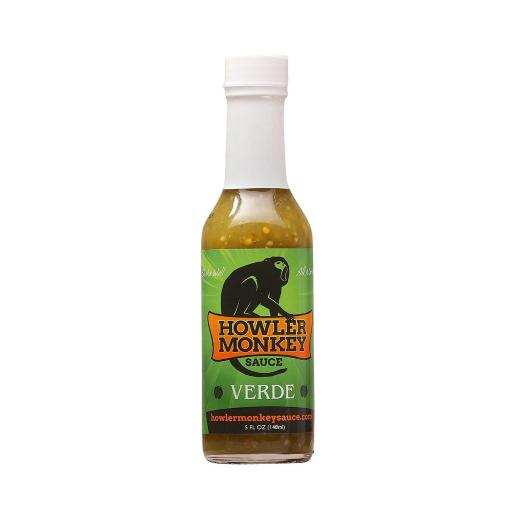 A 5-ounce bottle of Howler Monkey Verde Hot Sauce with a green label and white cap. The label features a black howler monkey graphic and bold orange lettering, while the sauce inside appears green with visible pepper seeds.