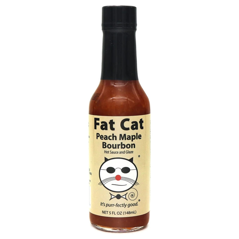 A bottle of Fat Cat Peach Maple Bourbon Hot Sauce and Glaze