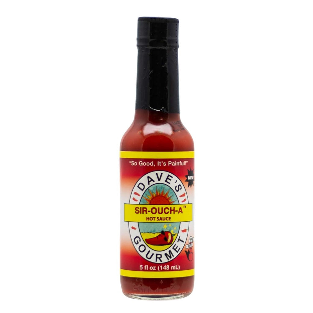 A 5-oz glass bottle of Dave’s Gourmet Sir-Ouch-A Hot Sauce with a black cap and deep red sauce inside. The label shows the Dave’s Gourmet sun logo and the name “Sir-Ouch-A Hot Sauce.” At the bottom, the label reads “5 fl oz (148 mL).” UPC: 753469000134