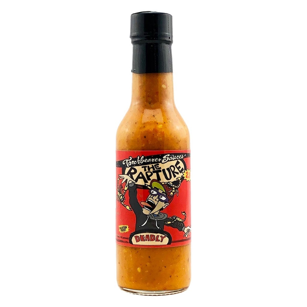 A bottle of Torchbearer “The Rapture” Hot Sauce with a black cap and thick orange-speckled sauce inside. The label features a cartoon man being grabbed by fiery hands on a bright red background, with bold text reading “The Rapture” and “Deadly.”