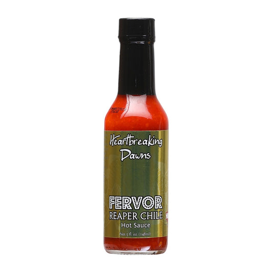 Bottle of Heartbreaking Dawn’s FERVOR Reaper Chile Hot Sauce, 5 fl oz, featuring a green label with bold typography and deep red sauce inside