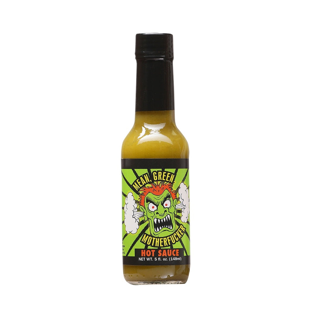 A 5 fl oz bottle of Mean Green Motherfucker Hot Sauce. The sauce inside is a bold green color, and the bottle has a black cap. The label features a bright, comic-style design with a snarling green-faced character with red hair and steam puffing from both sides. The background has sharp green rays, and the text reads “Mean Green Motherfucker” above the character and “Hot Sauce” below.