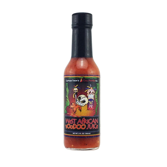 Bottle of Captain Thom’s West African VooDoo Juice Hot Sauce with colorful skull artwork on the label; 5 fl oz glass bottle showing a red-orange sauce inside. UPC 689076357951