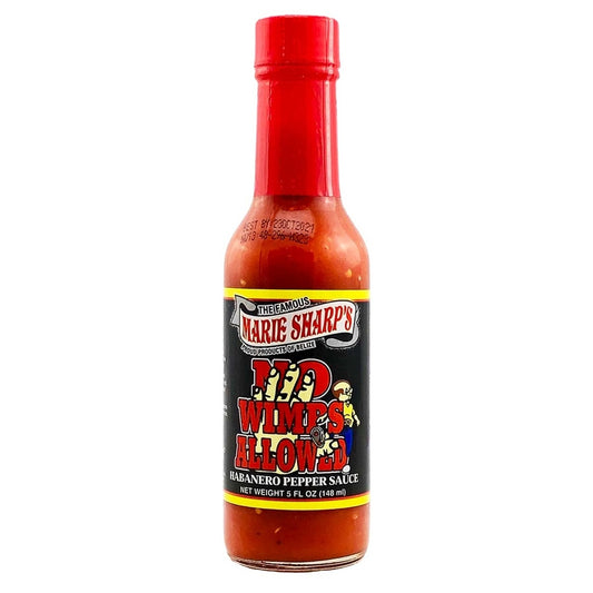 Bottle of Marie Sharp's H.D. Wimps Allowed hot sauce on a white background
