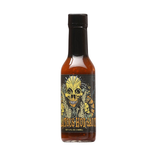A bottle of High River Sauces Hellacious Hot Sauce filled with a deep red-orange sauce. The bottle has a black cap and a dark, intense label featuring a stylized yellow skull with sharp teeth, surrounded by flames and chaotic artwork. The text “Hellacious Hot Sauce” appears at the bottom along with the size “Net 5 fl. oz (148 ml).”