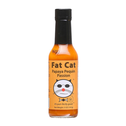A bottle of Fat Cat Papaya Pequin Passion Hot Sauce with orange label