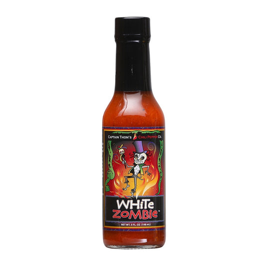 Bottle of Captain Thom’s White Zombie Hot Sauce with illustrated zombie label, 5 fl oz glass bottle, UPC 689076358057