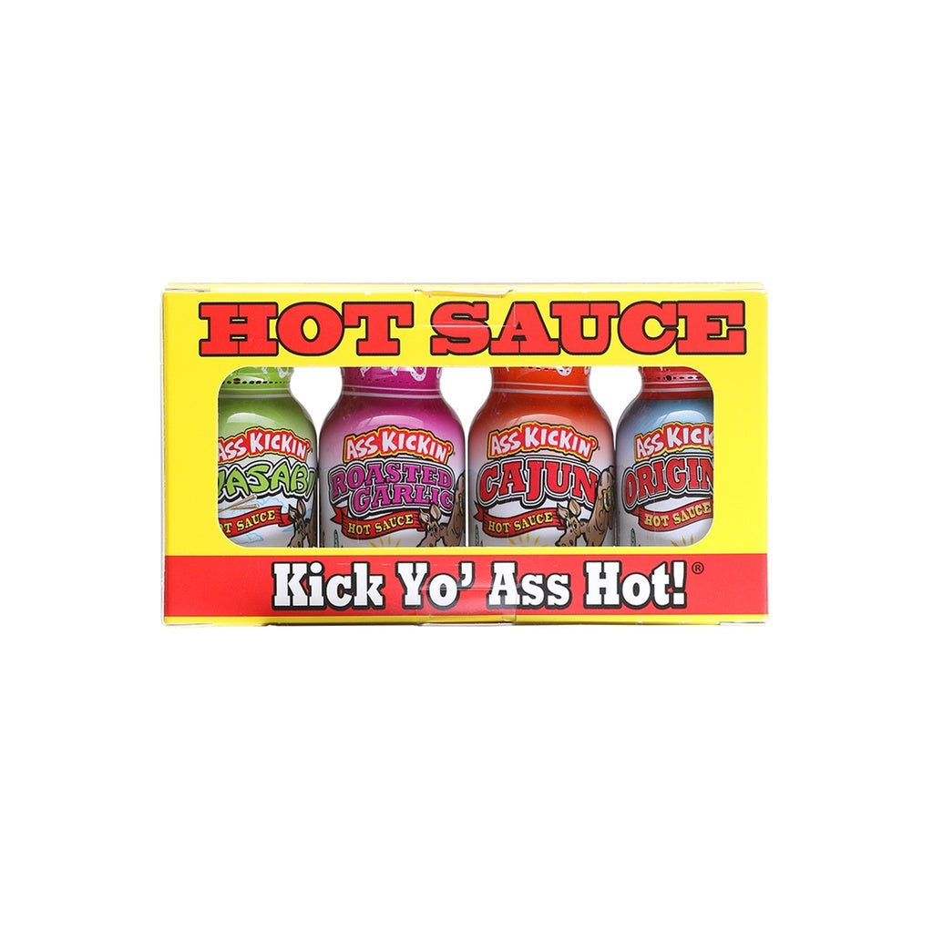 A yellow and red Ass Kickin’ Hot Sauce Mini 4-Pack gift box displaying four small bottles: Wasabi, Roasted Garlic, Cajun, and Original. The front reads “HOT SAUCE” at the top and “Kick Yo’ Ass Hot!” at the bottom.