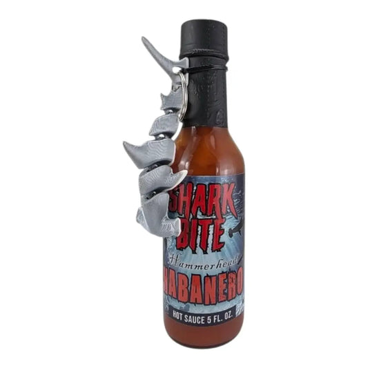 Shark Bite Hammerhead Habanero Hot Sauce 5 fl oz bottle with attached 3D articulating shark keychain and bold citrus habanero sauce UPC 701705500337