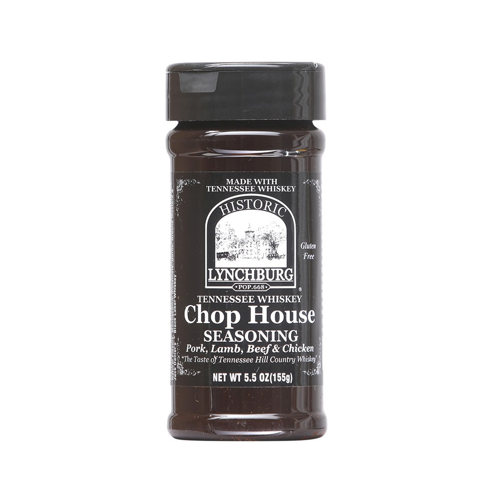 Plastic seasoning jar of Historic Lynchburg Tennessee Whiskey Chop House Seasoning with black label and black cap, filled with dark brown spice blend; labeled 5.5 oz.