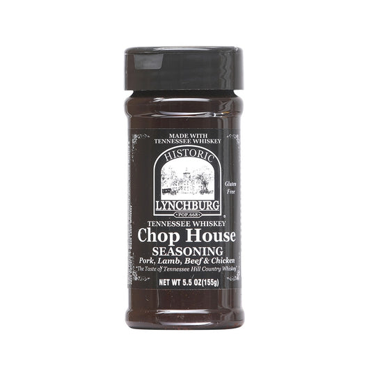 Plastic seasoning jar of Historic Lynchburg Tennessee Whiskey Chop House Seasoning with black label and black cap, filled with dark brown spice blend; labeled 5.5 oz.