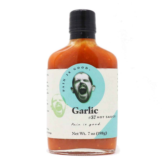 Glass bottle of Pain Is Good Batch #37 Garlic Hot Sauce with teal and white label and black cap, 7 oz bottle, UPC 032458972875