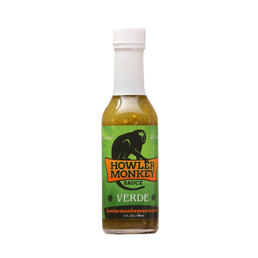 A 5-ounce bottle of Howler Monkey Verde Hot Sauce with a green label and white cap. The label features a black howler monkey graphic and bold orange lettering, while the sauce inside appears green with visible pepper seeds.