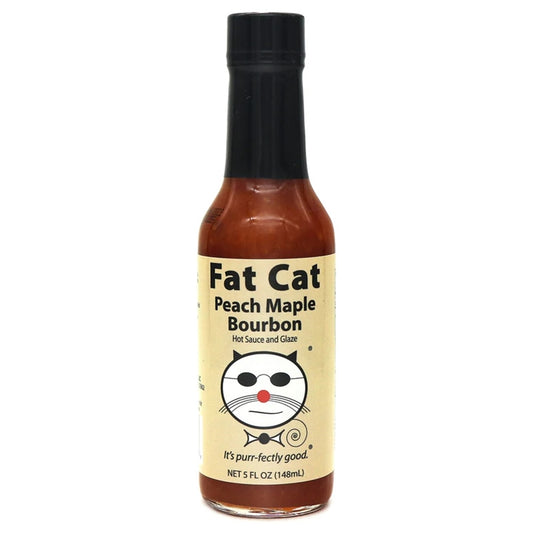 A bottle of Fat Cat Peach Maple Bourbon Hot Sauce and Glaze