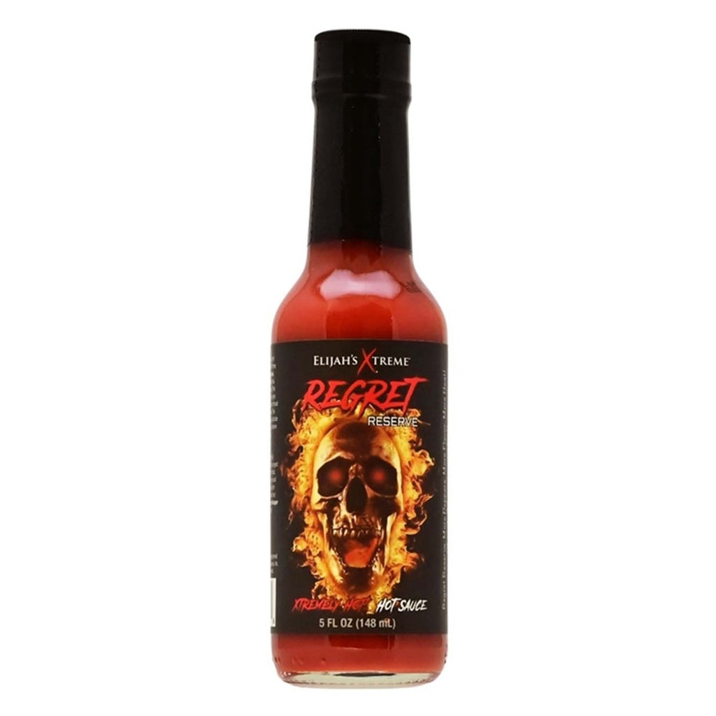A 5-ounce bottle of Elijah’s Xtreme Regret Reserve Hot Sauce with a black label featuring a flaming skull and bold red lettering. The sauce inside is deep red, and the bottle has a black cap.