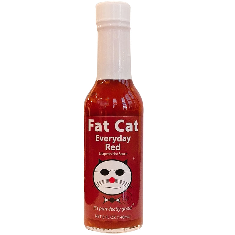 A bottle of Fat Cat Everday Red Jalapeno Hot Sauce with red label