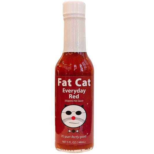 A bottle of Fat Cat Everday Red Jalapeno Hot Sauce with red label
