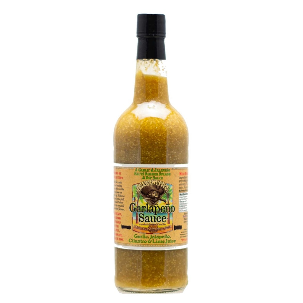 Tall glass bottle of Pirates Blend Garlapeño Sauce with green jalapeño-garlic sauce and tan label, 25.7 fl oz