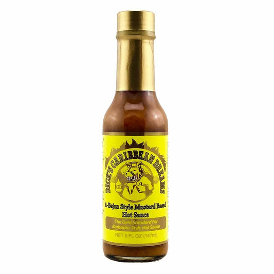 A 5-ounce bottle of Dirty Dick’s Caribbean Dreams Hot Sauce with a gold cap and bright yellow label. The label features a cartoon boar inside a flaming ring and text describing it as a Bajan-style mustard-based hot sauce.