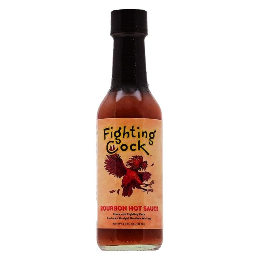 A glass bottle of Fighting Cock Bourbon Hot Sauce with a tan label showing a red rooster and the words “Bourbon Hot Sauce.” The bottle contains a reddish-brown sauce and has a black cap. UPC 727517114104