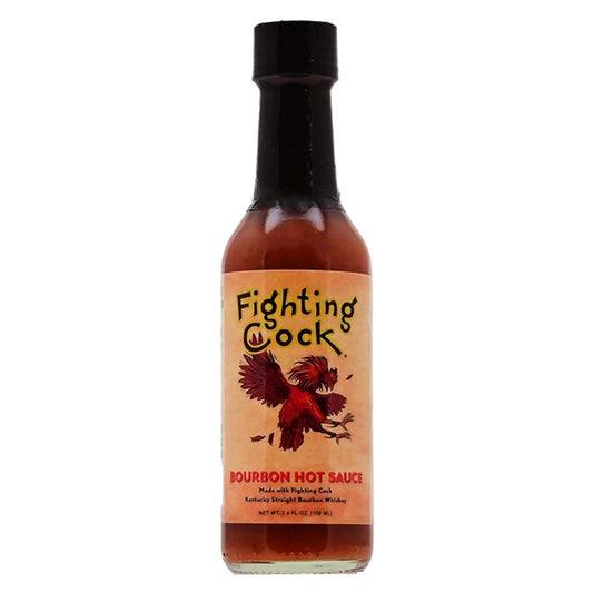 A glass bottle of Fighting Cock Bourbon Hot Sauce with a tan label showing a red rooster and the words “Bourbon Hot Sauce.” The bottle contains a reddish-brown sauce and has a black cap. UPC 727517114104