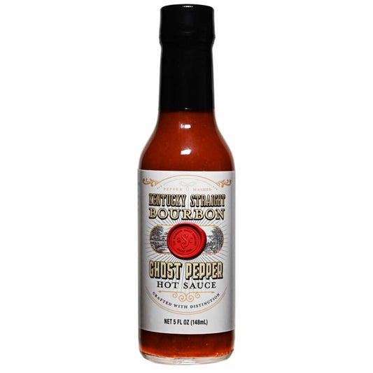 A 5-ounce glass bottle of Kentucky Straight Bourbon Ghost Pepper Hot Sauce with a white label and black cap. The label features gold and black lettering, a red wax-seal style emblem, and the words “Ghost Pepper Hot Sauce” displayed prominently.