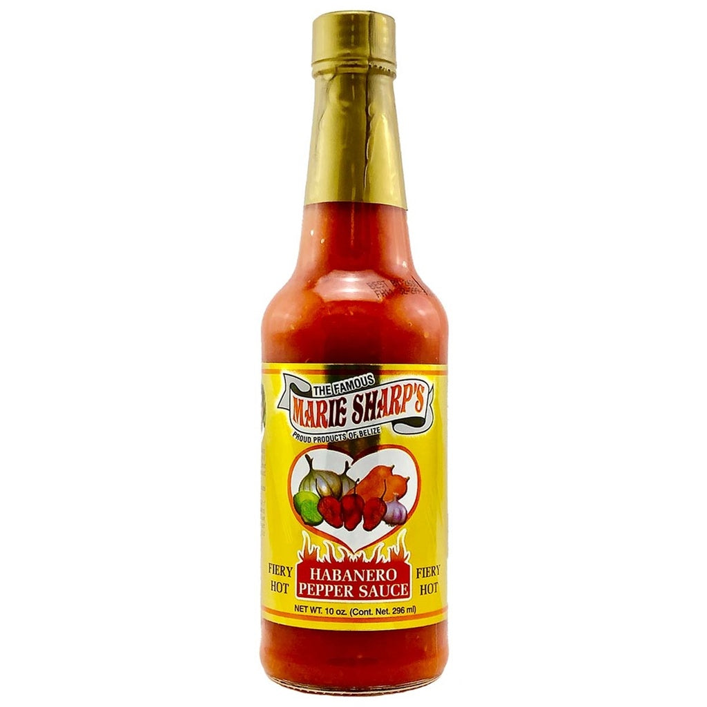 Marie Sharp’s Fiery Hot Habanero Hot Sauce bottle with yellow label, carrot-based habanero hot sauce from Belize, 10 fl oz