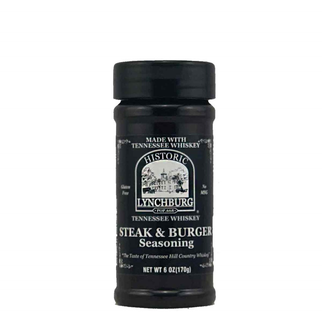 Black plastic shaker bottle of Historic Lynchburg Tennessee Whiskey Steak &amp; Burger Seasoning labeled 6 oz, featuring vintage black label with white text.