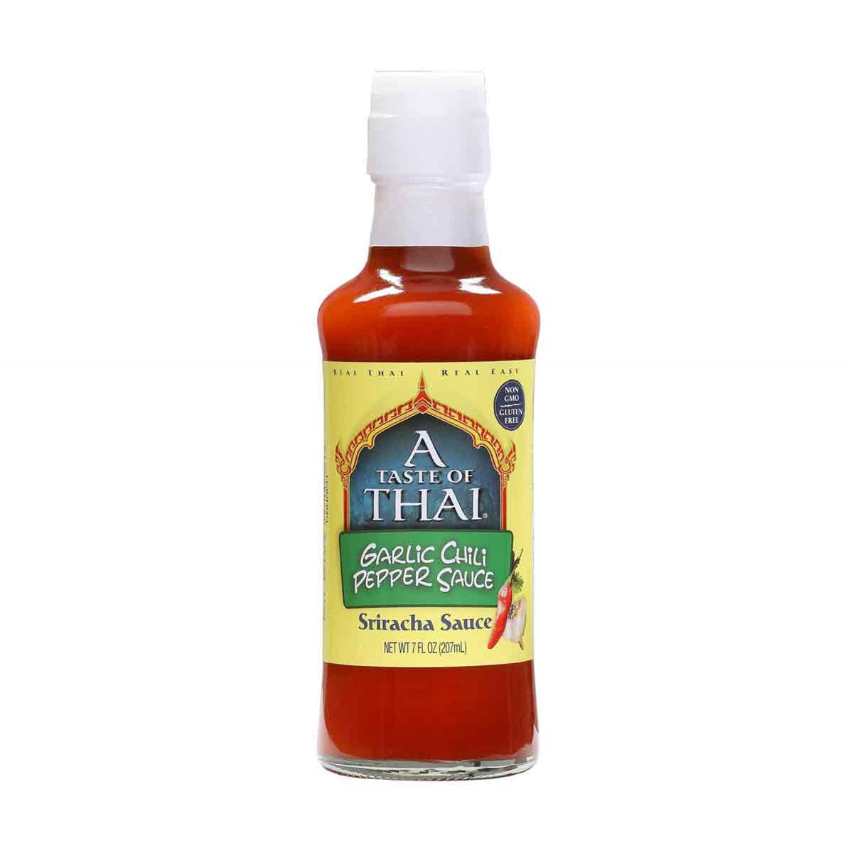 A bottle of A Taste Of Thai Garlic Chili Pepper Sriracha Sauce, featuring red chili and garlic, delivering a flavorful and spicy kick.