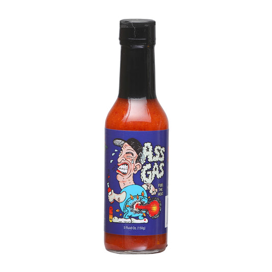 A bottle of Ass Gas Hot Sauce: Unleash the fiery storm of red habanero and Scotch bonnet peppers. Fuel the heat with Fireworks Fiery Food Merchants. Get it at PepperHotSpot.com. UPC: 735051040513.