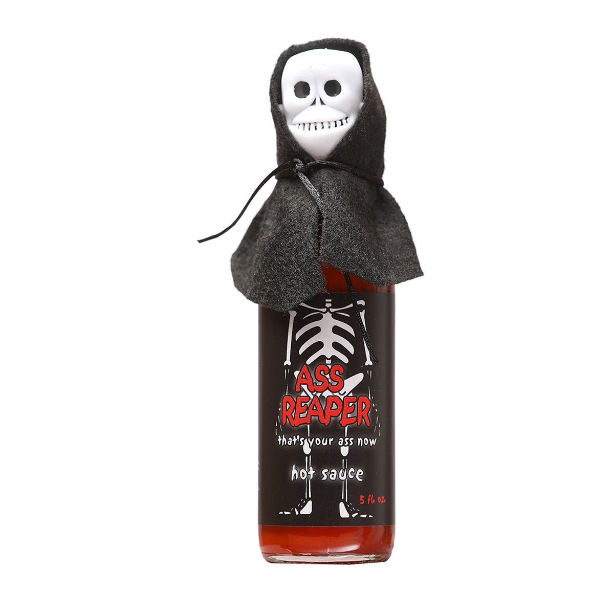 A bottle of Ass Reaper Hot Sauce with a skull cap and cape, featuring a spooky label design with a fiery background and a skeleton illustration. The 5 oz. bottle contains a blend of habanero peppers, water, African oleoresin, Scotch bonnet peppers, salt, onion, vegetable oil, acetic acid, garlic, and xanthan gum. UPC: 736924501964.