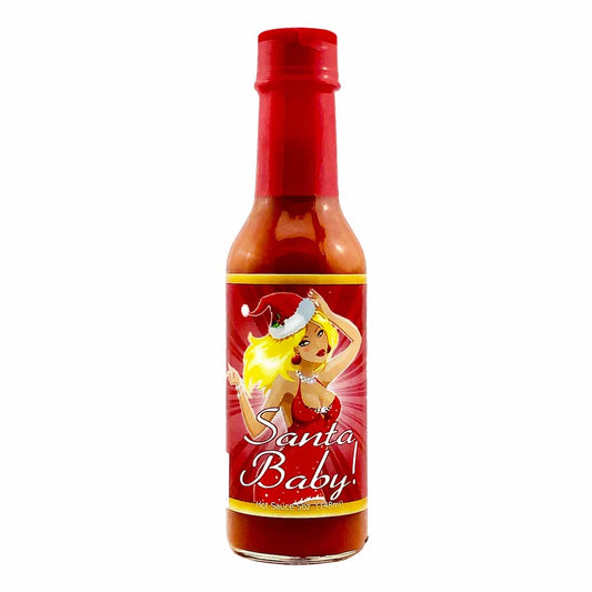 A festive bottle of Santa Baby! Hot Sauce, a personalized Christmas gift that brings the heat. The 5 fl. oz. (148 ml) bottle features a customized label with the recipient's name, a 'To:' and 'From:' message, and holiday-themed decorations. The sauce is a garlic habanero blend made with distilled vinegar, aged red habanero peppers, salt, dehydrated carrots, onions, and garlic. UPC: 700465772886