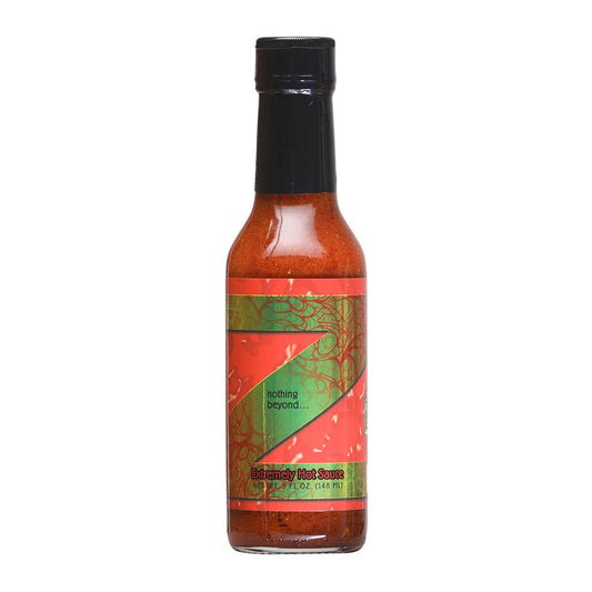 Bottle of Z Nothing Beyond Hot Sauce, a fiery and daring sauce with a label featuring flames and a devilish theme. The bottle size is 5 oz (148 ml), and the UPC is 647293003310. The sauce is known for its extreme heat level. The ingredients include vinegar, Habanero peppers, pepper extract, tomatoes, mustard, papaya, guava, pineapple, banana, water, sugar, passion fruit juice, and guava juice. It has won numerous awards. Use with caution and handle responsibly.