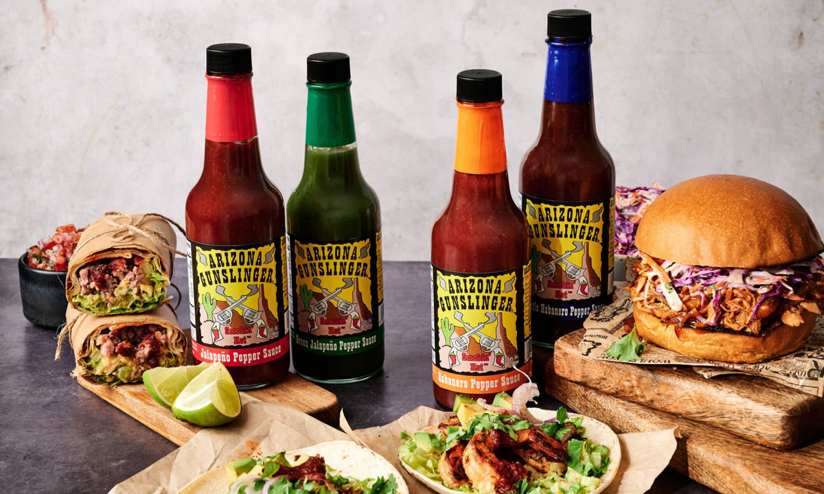 Arizona Gunslinger Smokin' Hot Red Jalapeño Pepper Sauce 5 fl oz, featuring Jalapeño, shown in a manufacturer lifestyle setting